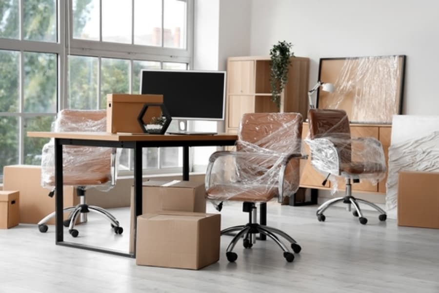 Office space being moved by professionals